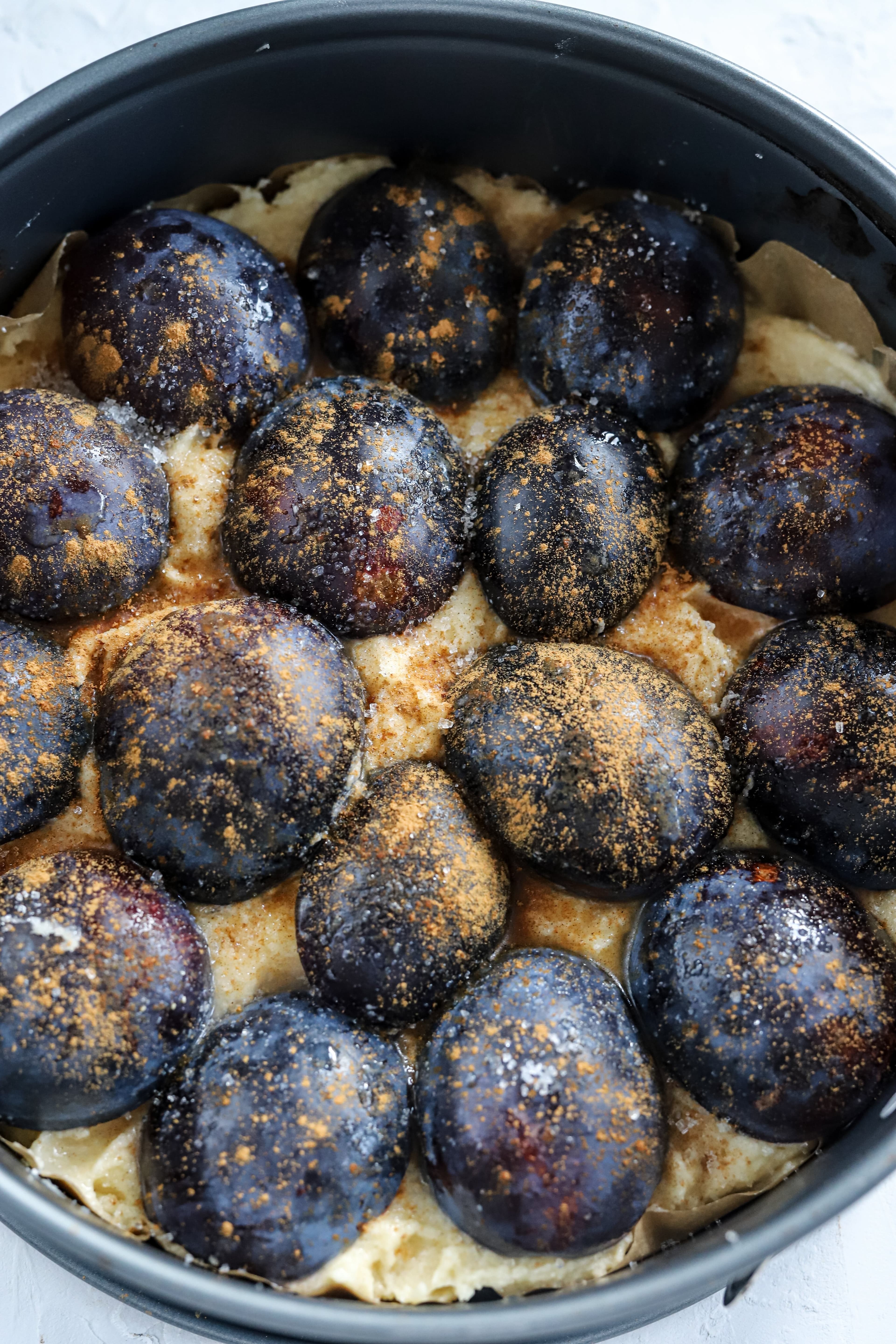 Then, add the plums
