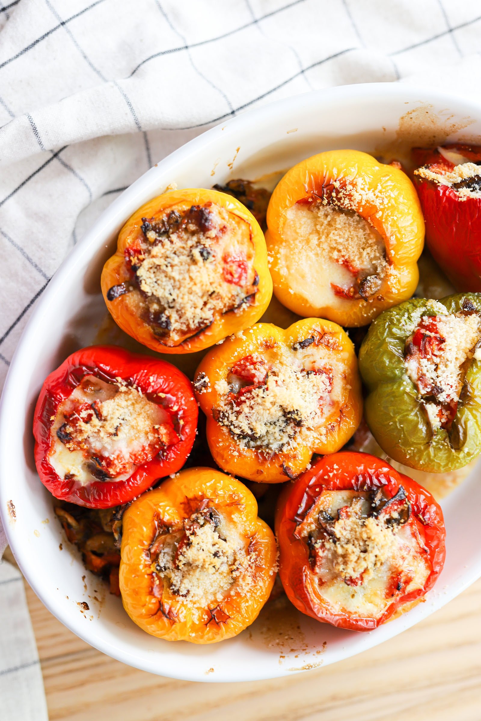 Stuffed baked bell peppers with minced chicken meat, mozzarella and tomatoes